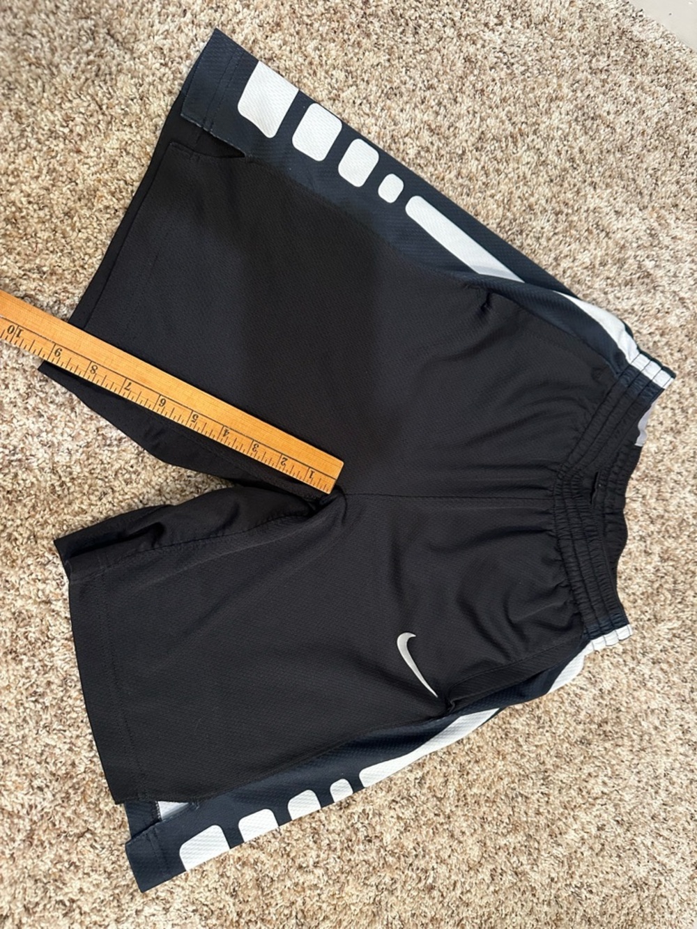 Nike Black Shorts with White Swoosh and Side Panels